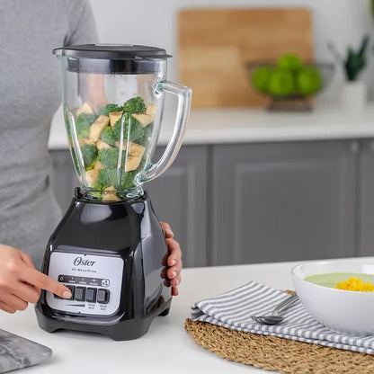 Licuadora Oster Clásica: 2 Velocidades + Pulso, Vaso de Vidrio 1.5 Lt y 550W de Potencia (Negro BLSTKAG-BP)